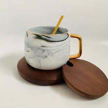 Load image into Gallery viewer, Sip In Style: Porcelain Marble Style Mug With Deep Bamboo Lid And Saucer